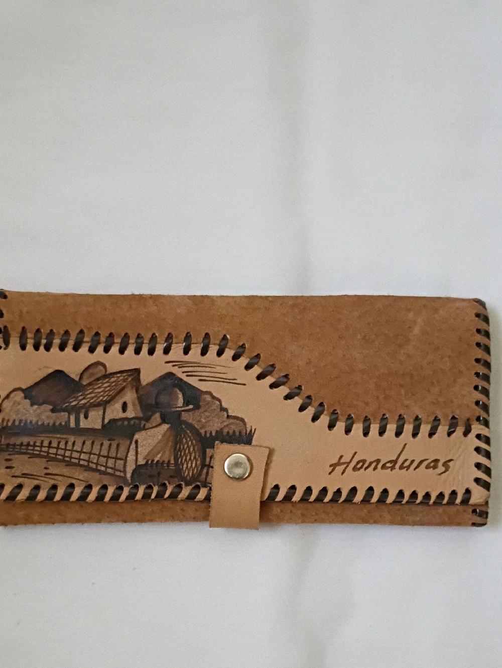 Handmade leather wallet by artisans from Honduras.